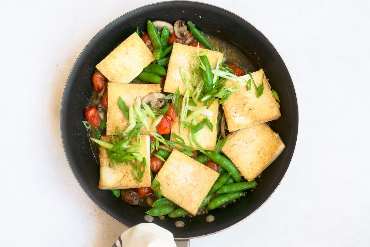 Low Carb Asian Seared Tofu With Burst Cherry Tomatoes And Peas